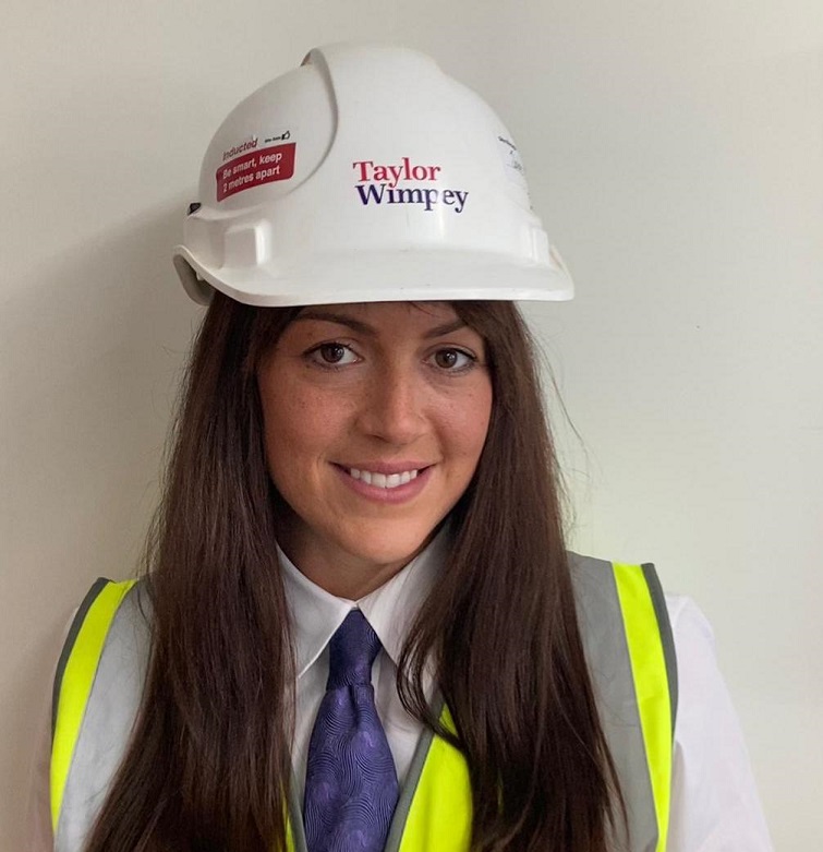 Jade Taylor in high visibility jacket and hardhat - portrait angle photo