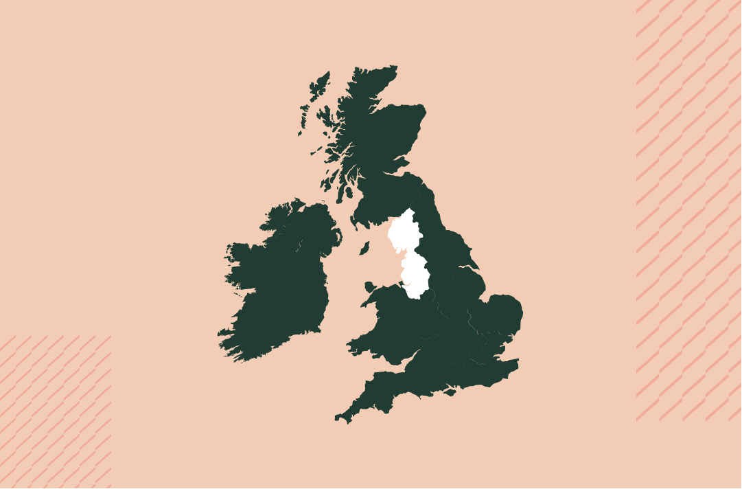 a map of the uk and ireland in navy on a salmon pink background with the north west region in white