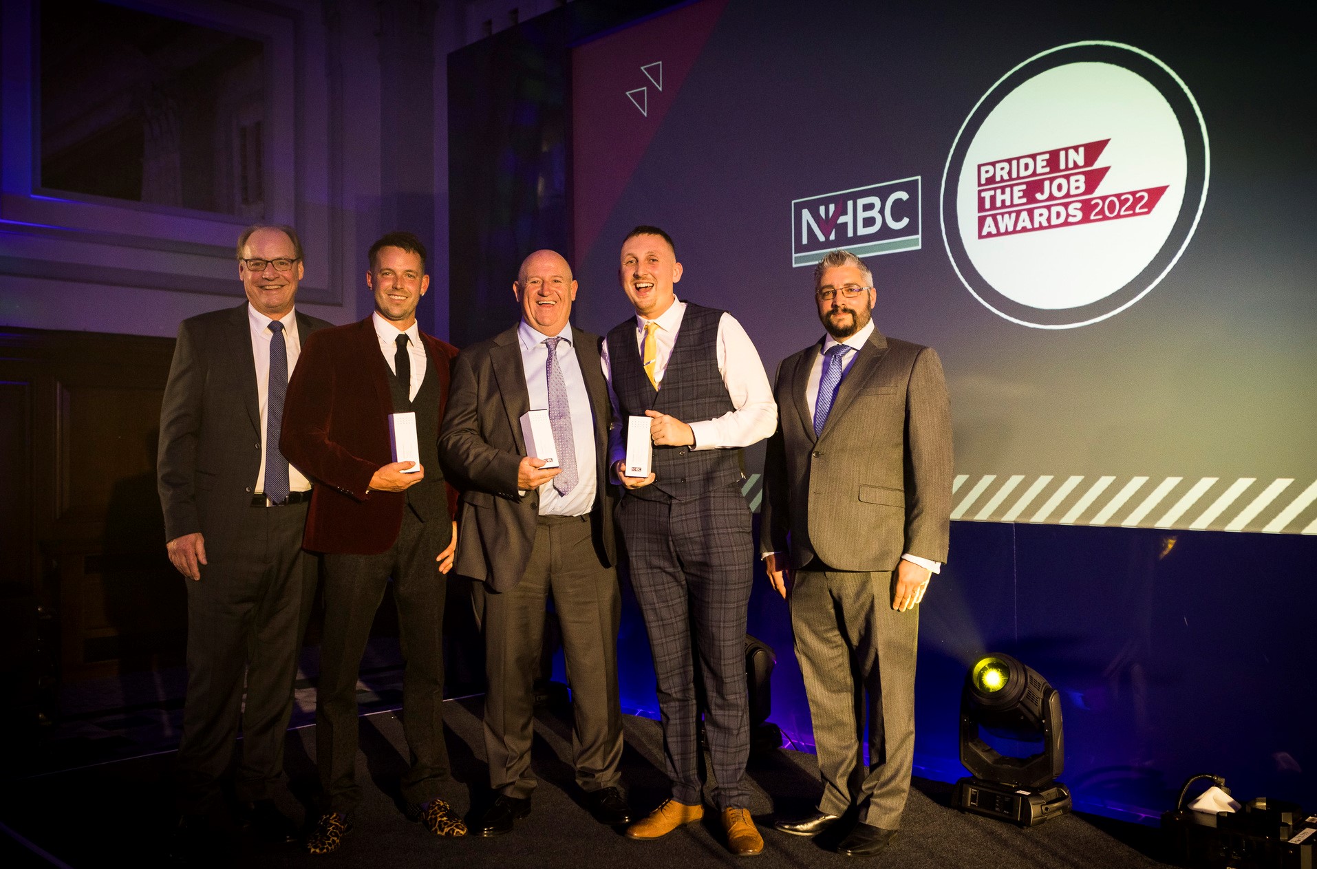 the north west regional winners of nhbc's pride in the job award smiling at the camera