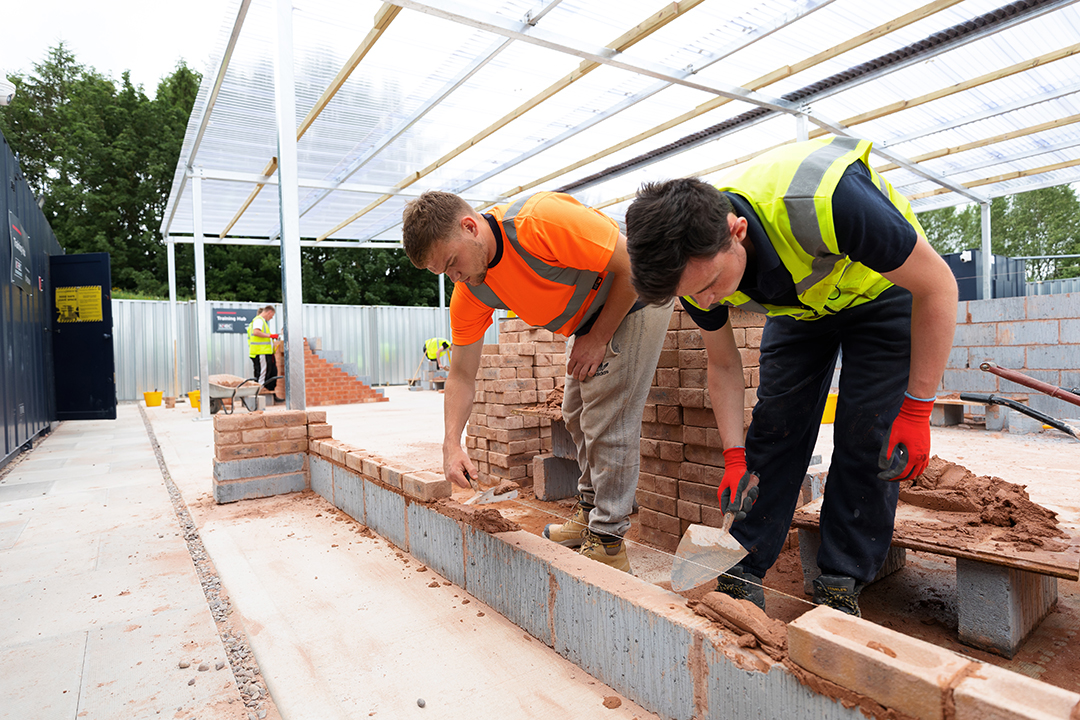 a photo of some bricklayers completing some training