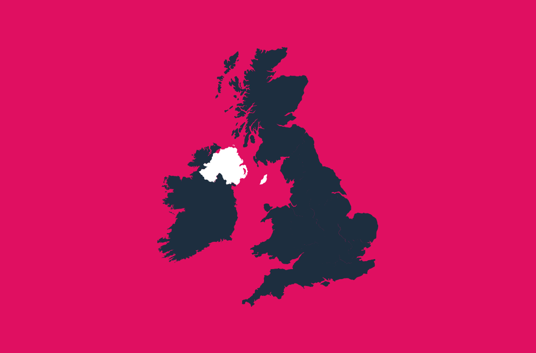 a map of the uk and ireland in navy on a pink background with the northern ireland and isle of man region in white