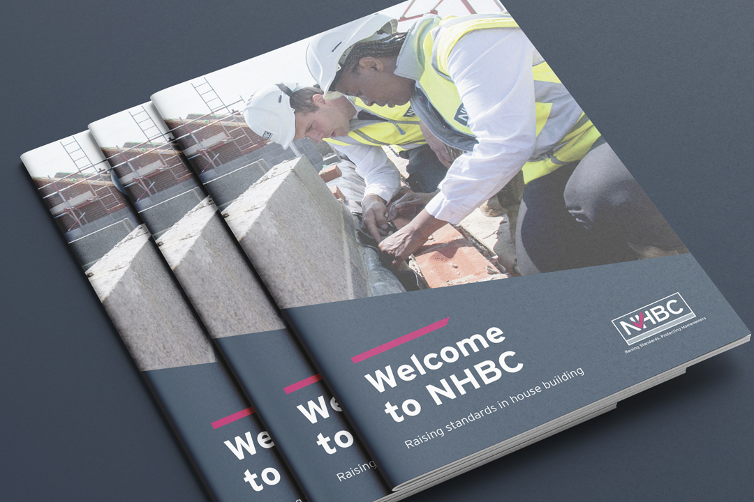 a photo of some nhbc brochures on a navy background